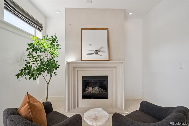 370 Garfield St, Denver, CO 80206 - living room featuring a glass covered fireplace and baseboards