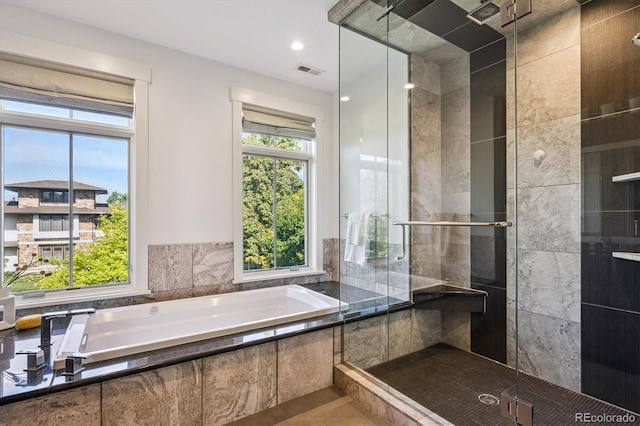 370 Garfield St, Denver, CO 80206 - bathroom with a bath and a stall shower