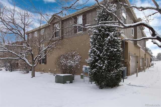 view of snow covered property