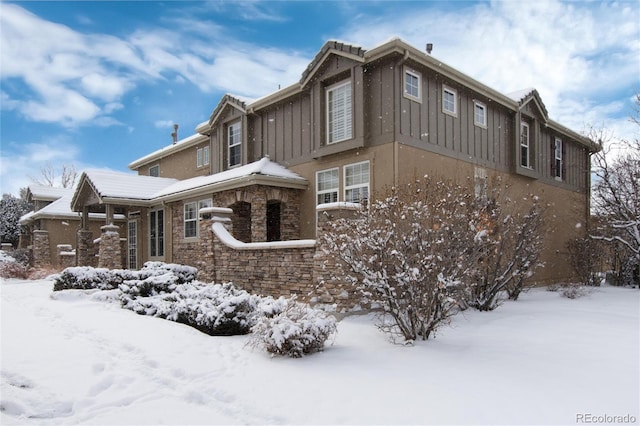 view of snow covered property