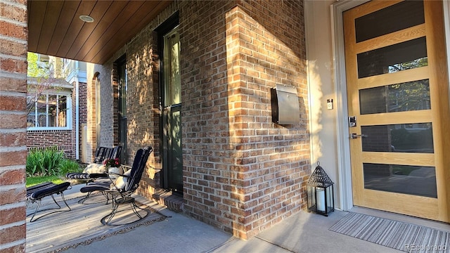 501 S Race St, Denver, CO 80209 - entrance to property featuring brick siding and covered porch
