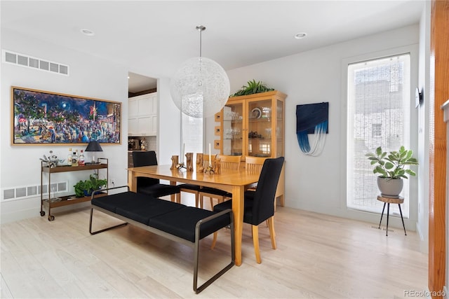 501 S Race St, Denver, CO 80209 - dining space with light wood-style floors, a chandelier, recessed lighting, and baseboards