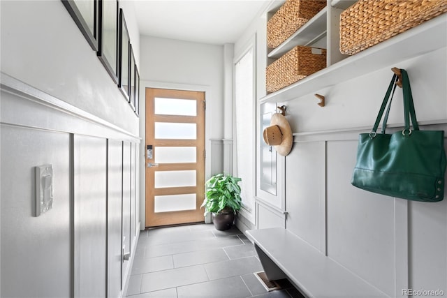 501 S Race St, Denver, CO 80209 - mudroom with a decorative wall, tile patterned flooring, and a wainscoted wall