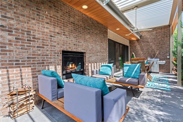 501 S Race St, Denver, CO 80209 - view of patio / terrace with an outdoor living space with a fireplace and ceiling fan