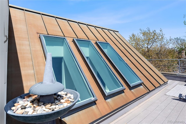 501 S Race St, Denver, CO 80209 - view of home's exterior with a standing seam roof and metal roof