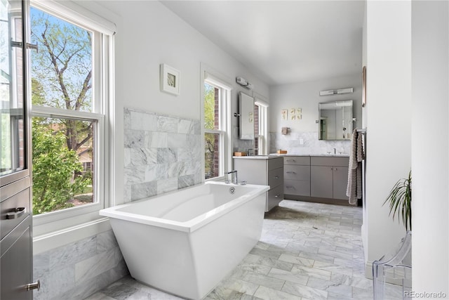 501 S Race St, Denver, CO 80209 - full bath featuring marble finish flooring, a freestanding bath, and vanity