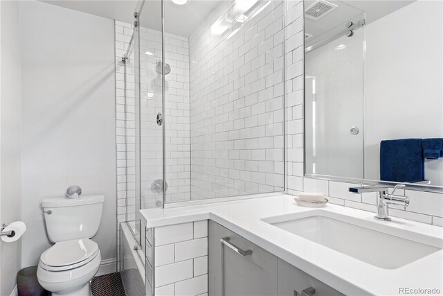 501 S Race St, Denver, CO 80209 - full bathroom with toilet, washtub / shower combination, and vanity