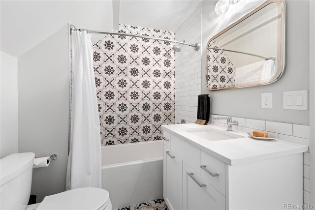 501 S Race St, Denver, CO 80209 - full bathroom featuring toilet, shower / bath combo with shower curtain, and vanity