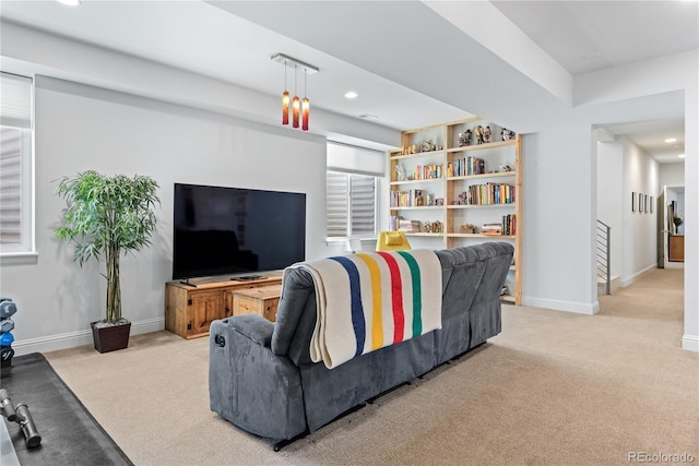 501 S Race St, Denver, CO 80209 - living room featuring light carpet, baseboards, and recessed lighting