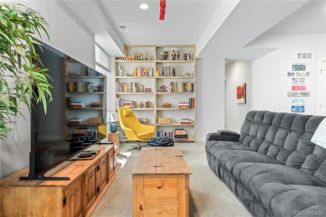 501 S Race St, Denver, CO 80209 - living room featuring light carpet, baseboards, and recessed lighting