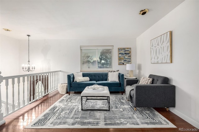 7912 Fenton St, Arvada, CO 80003 - living room with a chandelier and wood finished floors