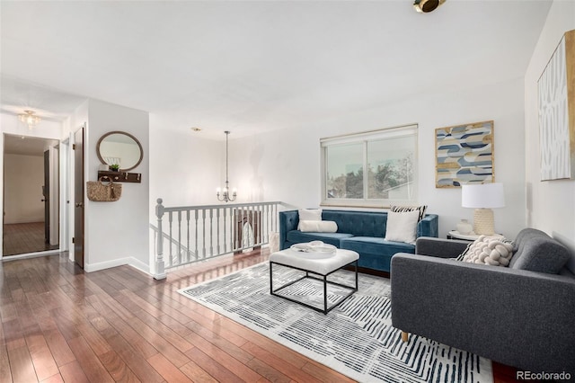 7912 Fenton St, Arvada, CO 80003 - living area with a chandelier and hardwood / wood-style flooring