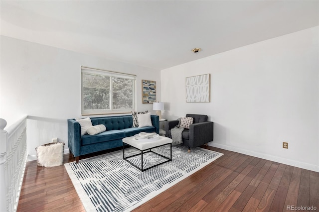 7912 Fenton St, Arvada, CO 80003 - living area featuring hardwood / wood-style flooring and baseboards