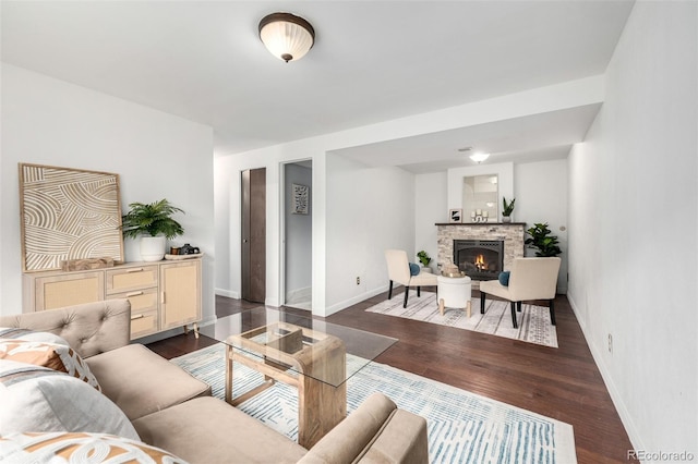 7912 Fenton St, Arvada, CO 80003 - living area with dark wood-type flooring and a fireplace