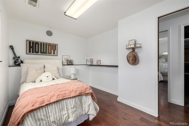 7912 Fenton St, Arvada, CO 80003 - bedroom with wood finished floors and baseboards