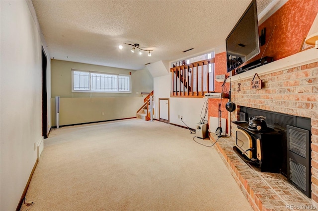 4738 Dover Dr, Colorado Springs, CO 80916 - living room with stairs, carpet flooring, and a textured ceiling