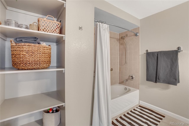 1150 Vine St Unit 201, Denver, CO 80206 - full bath featuring shower / tub combo with curtain and baseboards