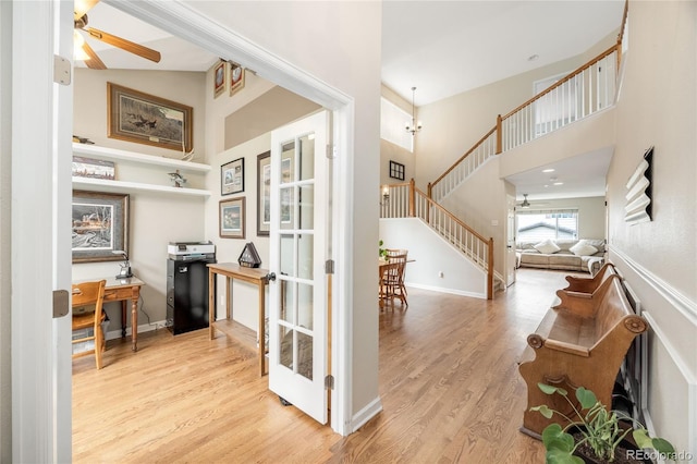 2753 E 139th Dr, Thornton, CO 80602 - entrance foyer with a ceiling fan, a towering ceiling, stairs, and wood finished floors