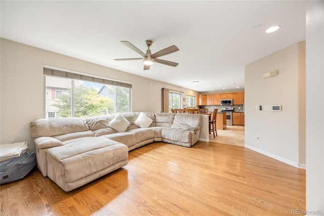 2753 E 139th Dr, Thornton, CO 80602 - living area with a ceiling fan, light wood-type flooring, and recessed lighting