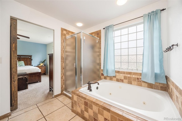 2753 E 139th Dr, Thornton, CO 80602 - bathroom with ensuite bathroom, a shower stall, a jetted tub, and tile patterned floors