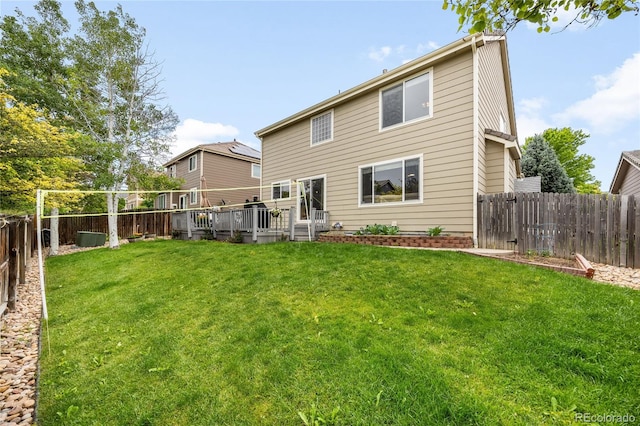2753 E 139th Dr, Thornton, CO 80602 - rear view of house with a fenced backyard and a deck