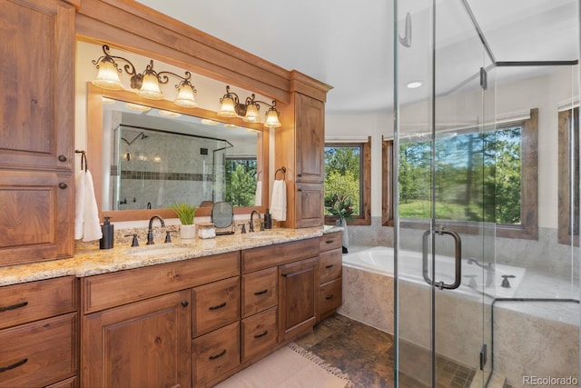 bathroom with a shower stall, a bath, double vanity, and a sink