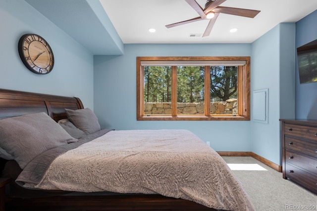 bedroom featuring carpet flooring, a ceiling fan, visible vents, baseboards, and recessed lighting