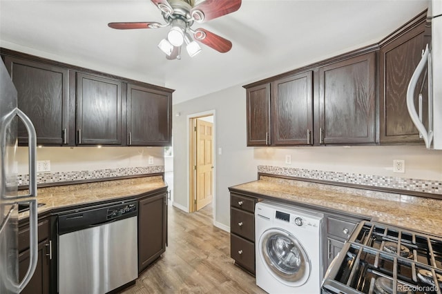 laundry area with ceiling fan, washer / dryer, and light hardwood / wood-style floors