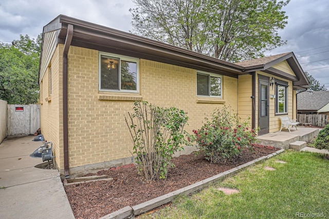 7618 Umatilla St, Denver, CO 80221 - view of property exterior with brick siding