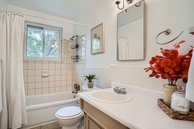 7618 Umatilla St, Denver, CO 80221 - bathroom with vanity, toilet, shower / tub combo with curtain, and tile walls
