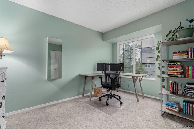 11147 W 17th Ave Unit 103, Lakewood, CO 80215 - home office with carpet flooring, a textured ceiling, and baseboards