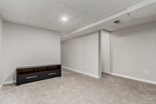 11147 W 17th Ave Unit 103, Lakewood, CO 80215 - finished basement with baseboards, visible vents, carpet, and a paneled ceiling