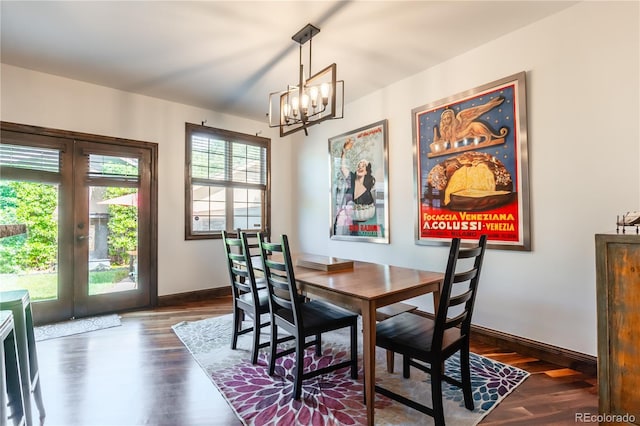 690 S Emerson St, Denver, CO 80209 - dining area featuring a chandelier, french doors, and dark wood-style flooring