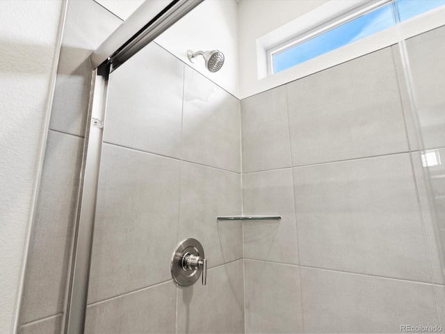 bathroom view of tiled shower