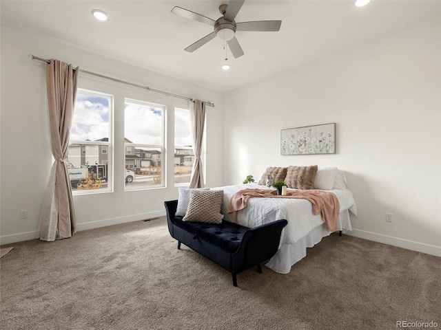 carpeted bedroom with baseboards, a ceiling fan, and recessed lighting