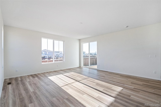 empty room featuring light wood-type flooring