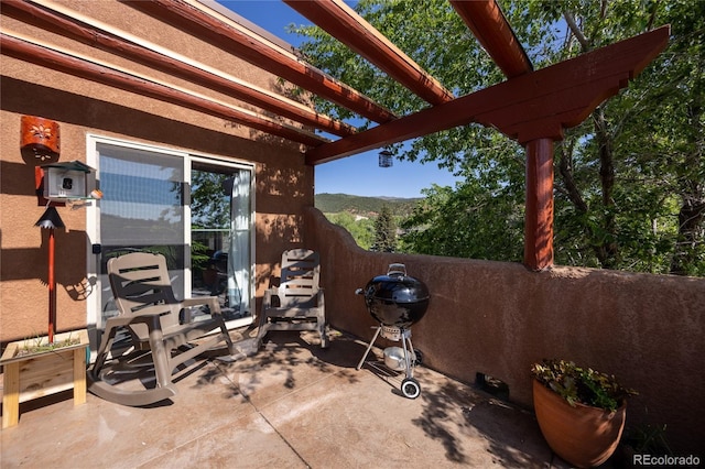 10 Taos Pl, Manitou Springs, CO 80829 - view of patio featuring a pergola and grilling area