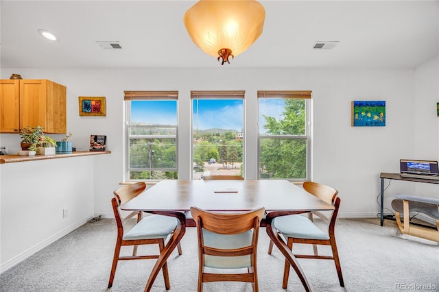 10 Taos Pl, Manitou Springs, CO 80829 - dining room featuring light colored carpet, plenty of natural light, and recessed lighting