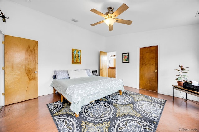 10 Taos Pl, Manitou Springs, CO 80829 - bedroom with ceiling fan, finished concrete floors, and ensuite bathroom