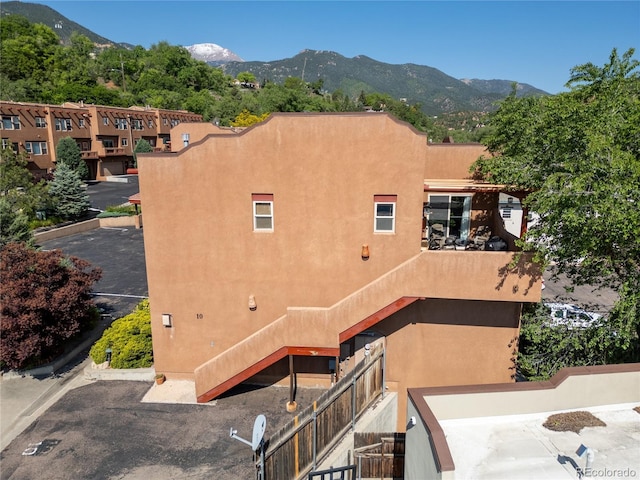 10 Taos Pl, Manitou Springs, CO 80829 - back of house featuring a mountain view and stucco siding
