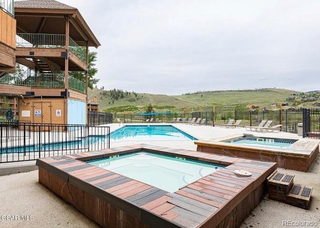 62927 US Highway 40 Unit 127, Granby, CO 80446 - community pool with a community hot tub and a patio