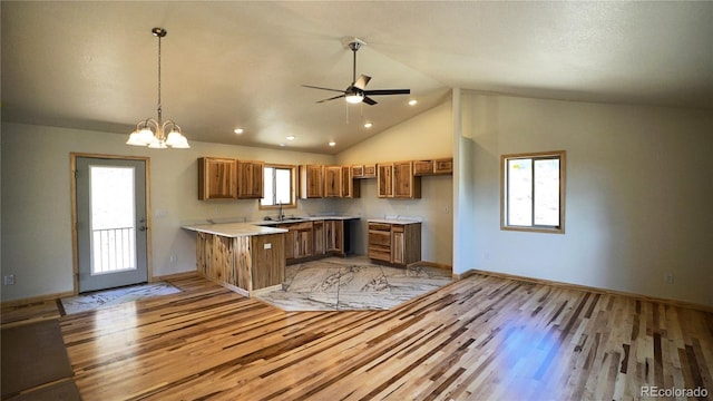 325 Bob Cat Trl, Bailey, CO 80421 - kitchen featuring a peninsula, light wood finished floors, brown cabinetry, ceiling fan, and recessed lighting