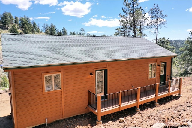 325 Bob Cat Trl, Bailey, CO 80421 - rear view of property with roof with shingles and a deck