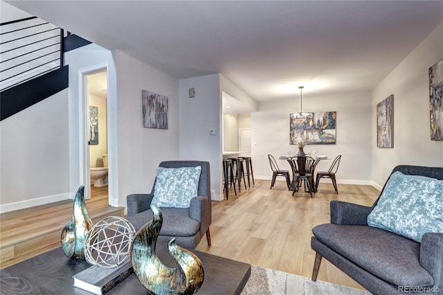 living area with light hardwood / wood-style floors