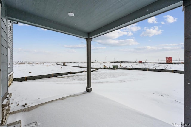 view of snowy yard