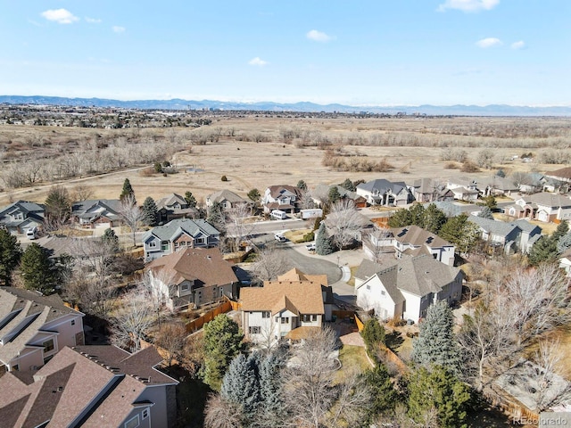 aerial view with a residential view and a mountain view