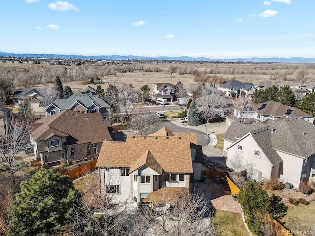 bird's eye view featuring a residential view and a mountain view