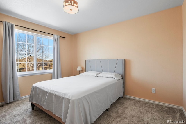 bedroom featuring carpet, visible vents, and baseboards