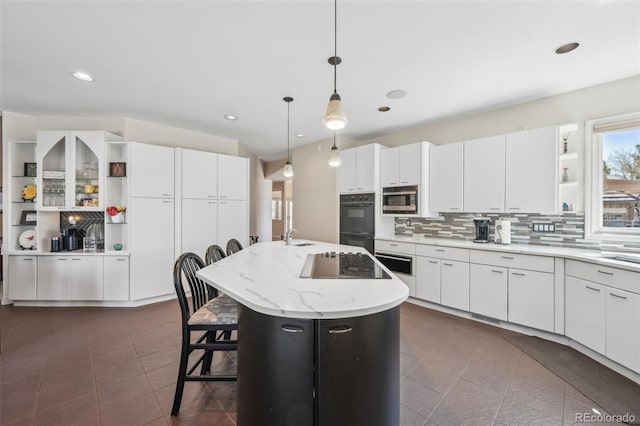kitchen with decorative backsplash, a breakfast bar area, dobule oven black, open shelves, and built in microwave
