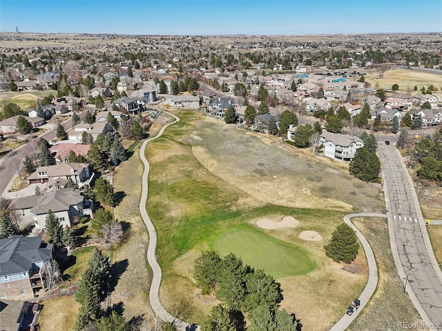 birds eye view of property with a residential view and golf course view